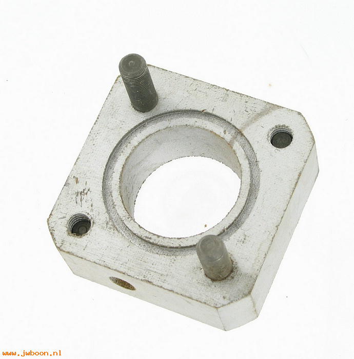   27012-67 (27012-67): Insulating block, carburetor mtg (has 1 longer stud) - NOS - XLCH