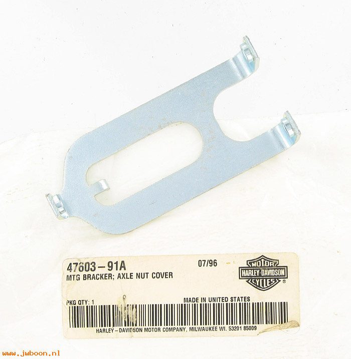   47603-91A (47603-91A): Mounting bracket - axle nut cover - NOS - Softail, FXST