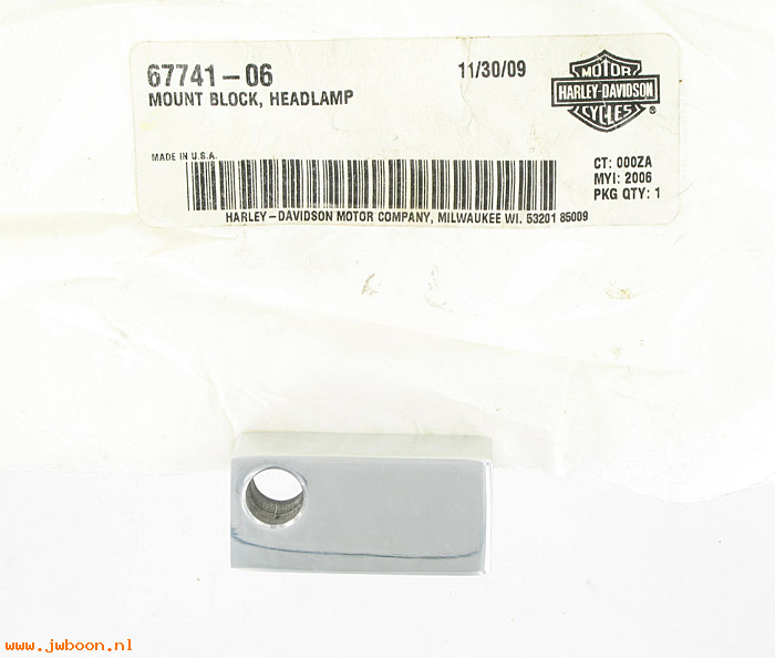   67741-06 (67741-06): Mounting block - headlamp - NOS - FXD, Dyna