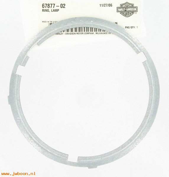   67877-02 (67877-02): Ring, lamp - NOS - Sportster XL883/1200R '04. FXD, Dyna '03-'04