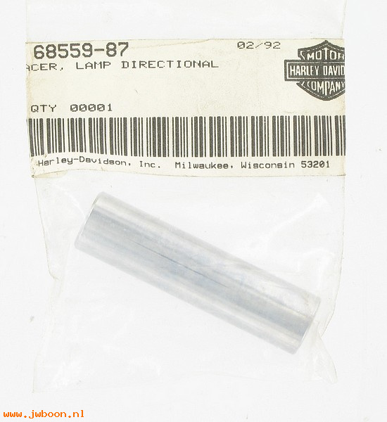   68559-87 (68559-87): Spacer, lamp, directional - NOS - Sportster XL 87-93. FXST 87-90